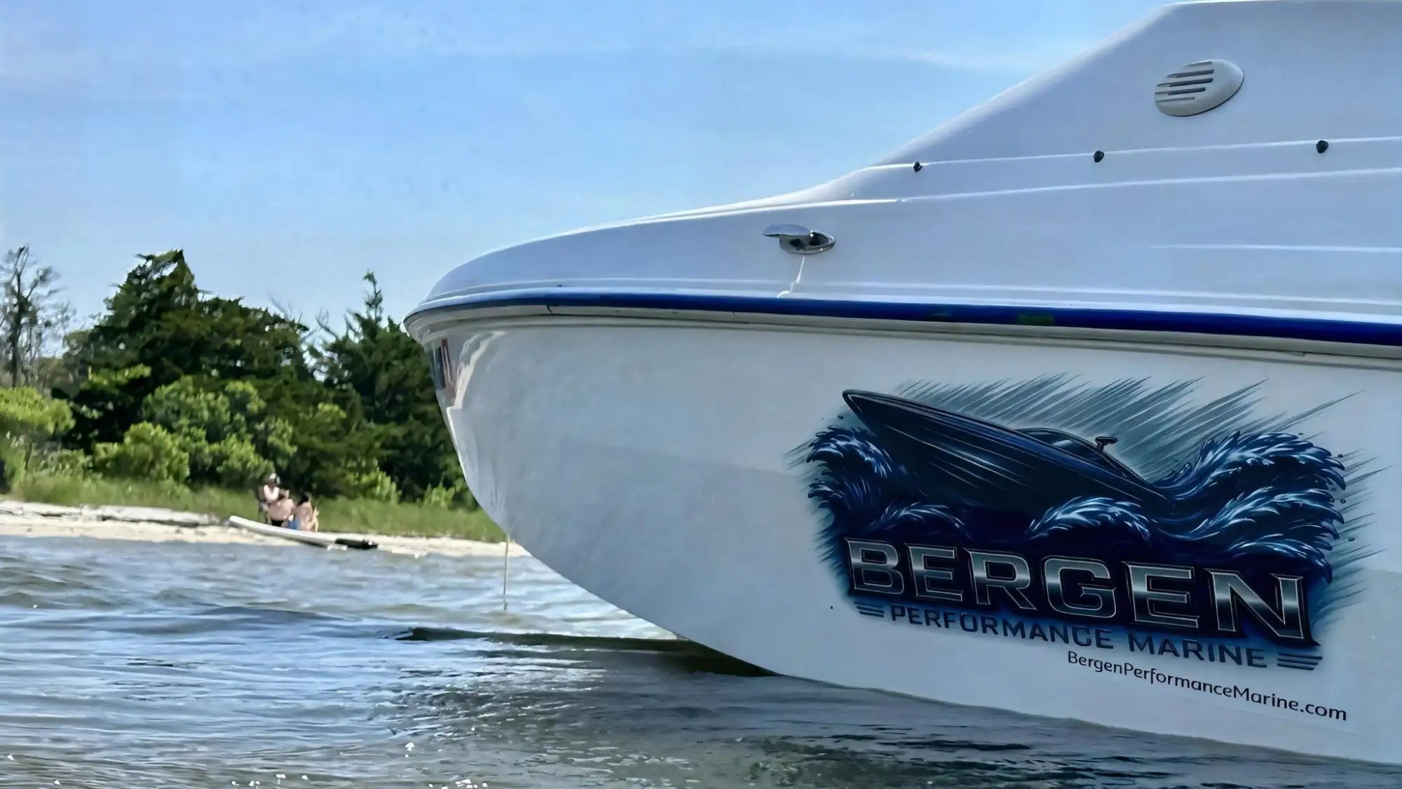 Boat with 'Bergen Performance Marine' logo on a body of water