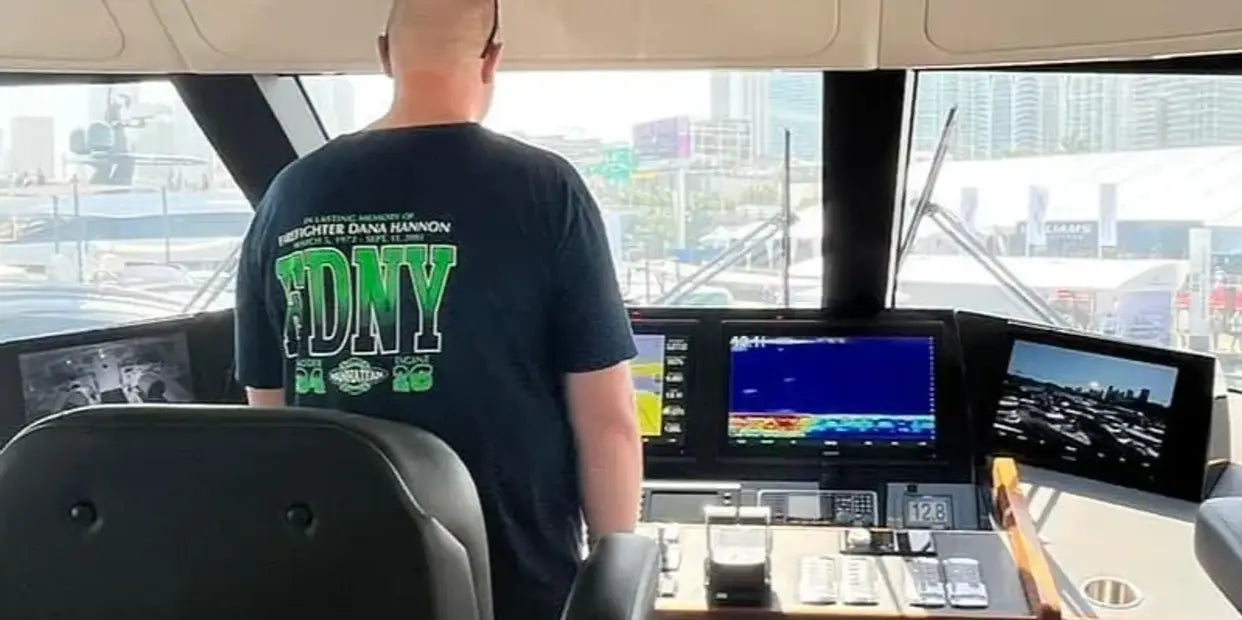 Business owner at helm of a Viking 80.